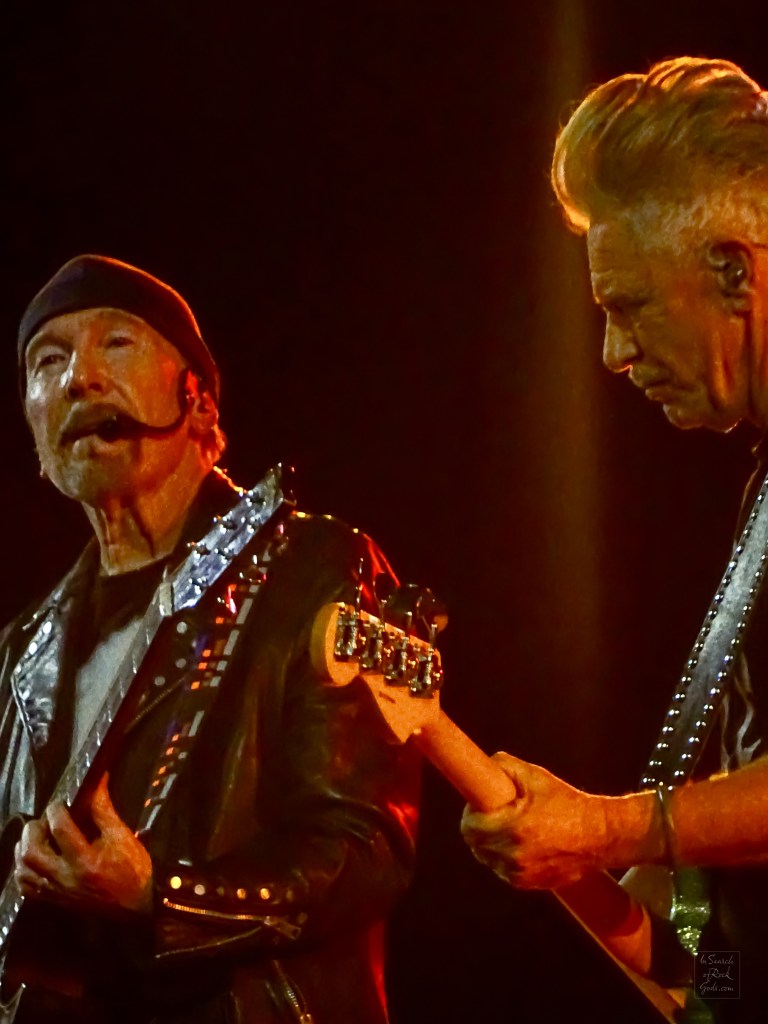 A close up photo of The Edge and Adam Clayton from U2. From the U2:UV Achtung Baby at the Sphere concert in Las Vegas March 1, 2024. 