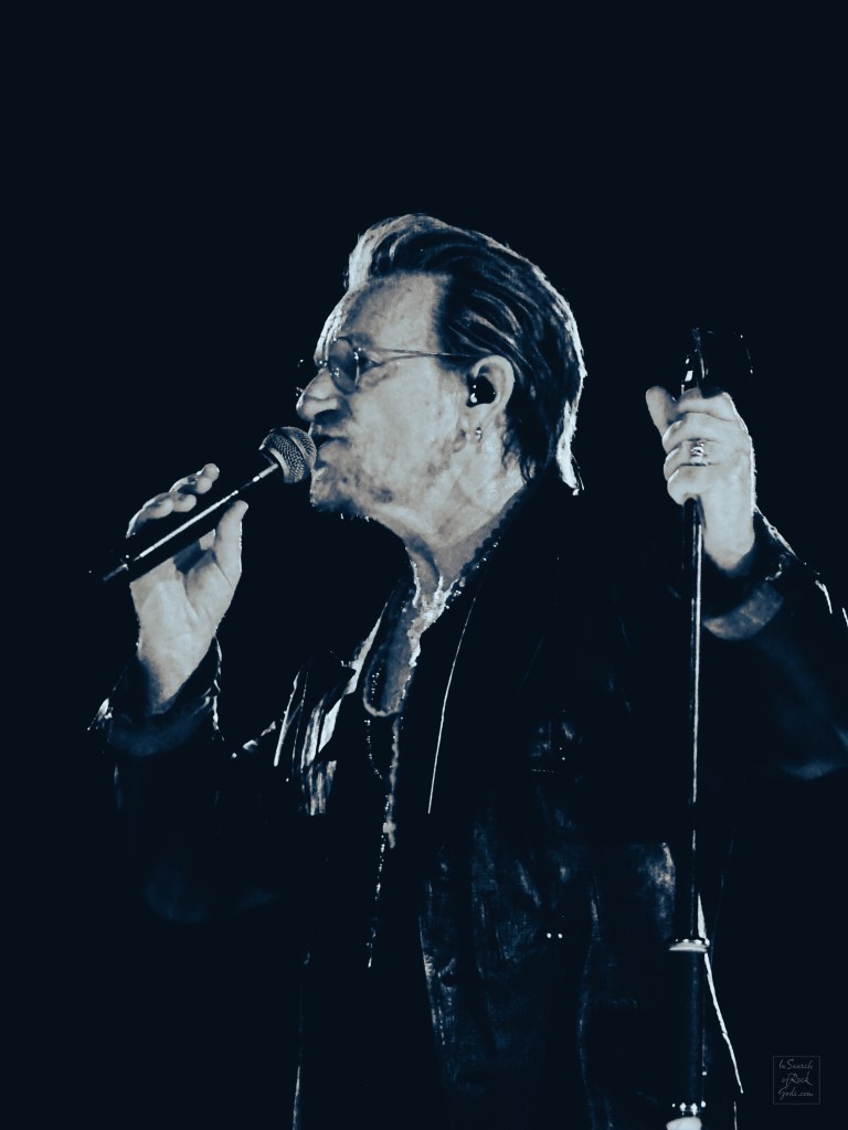 A black and white close up photo of Bono in profile from the U2:UV Achtung Baby at the Sphere concert in Las Vegas March 1, 2024. 