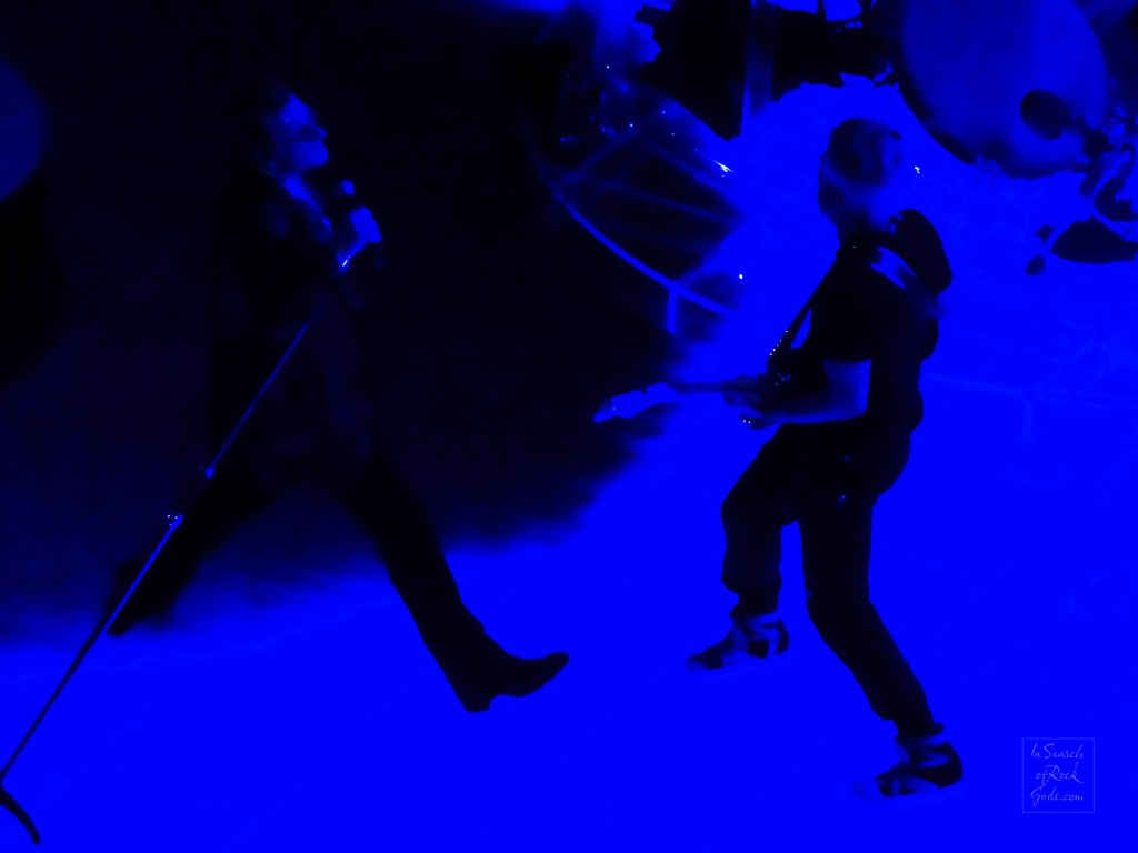 A photo in blue light of Bono and Adam Clayton at the U2:UV Achtung Baby at the Sphere concert in Las Vegas March 2, 2024.