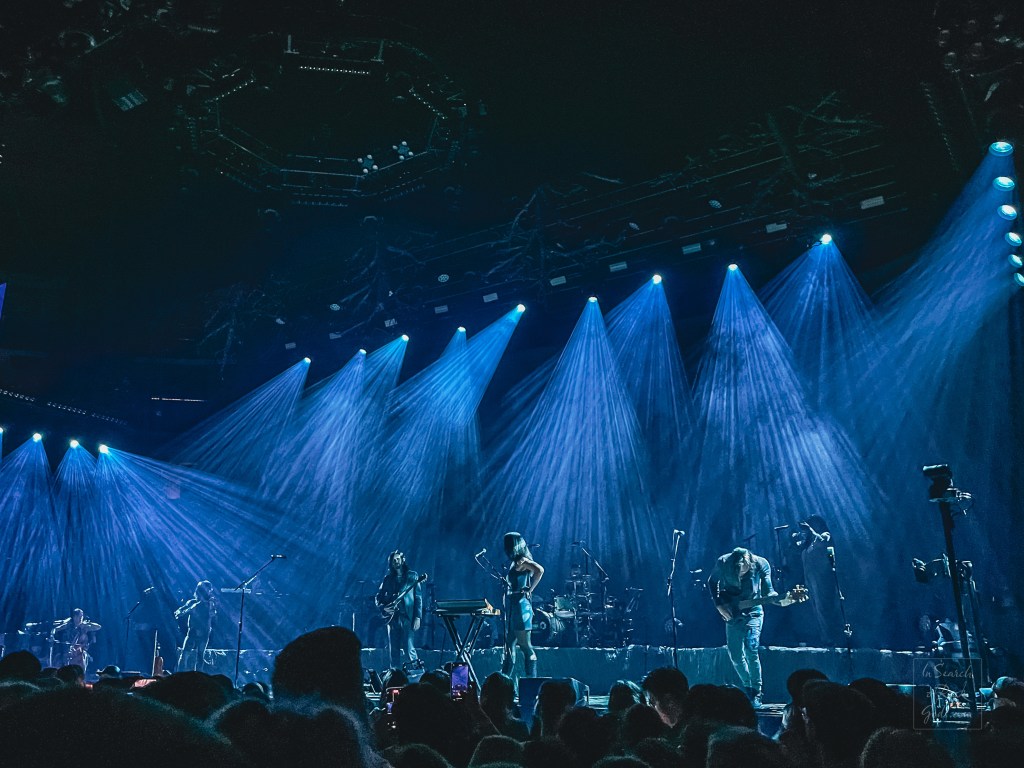 A photo of the stage with lights and Hozier in concert. Unreal Unearth Tour Rogers Place Edmonton August 24, 2024