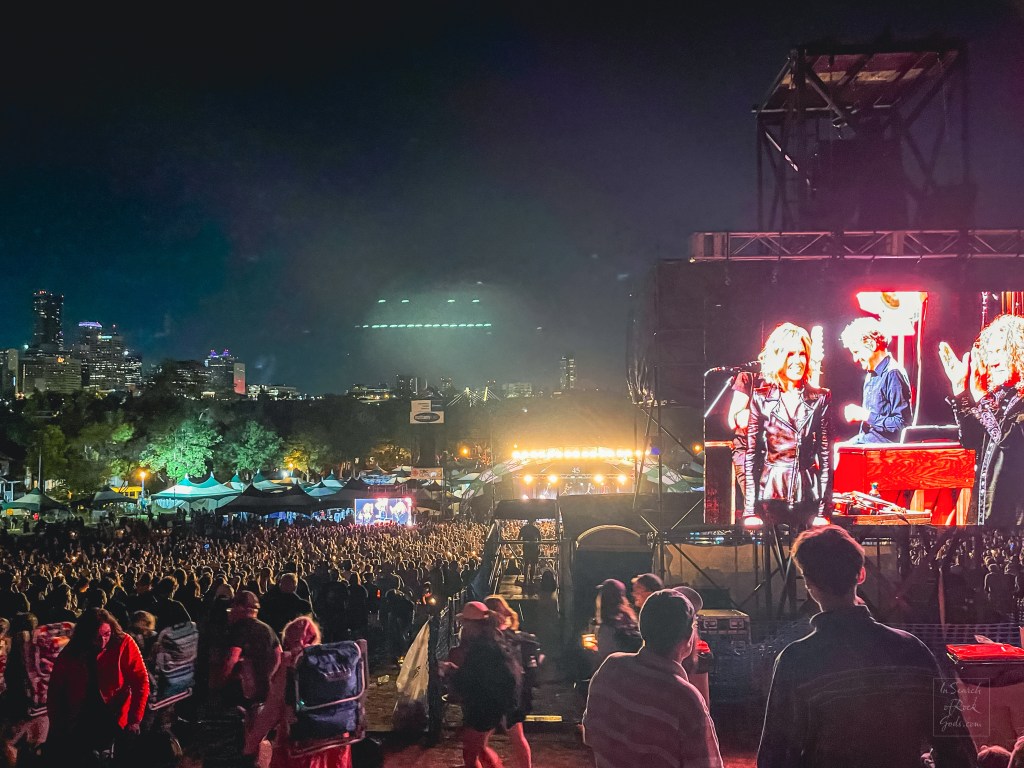 Robert Plan and Alison Krauss on the jumbotron at Main Stage iat night with audience Edmonton Folk Fest 2024