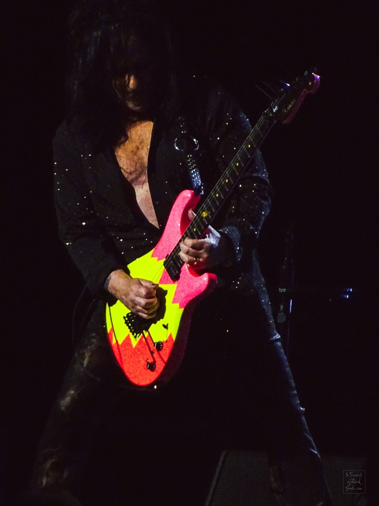 A photo of Steve Stevens playing a Neon Guitar at the Billy Idol concert. Rogers Place Edmonton Aug 1 2024